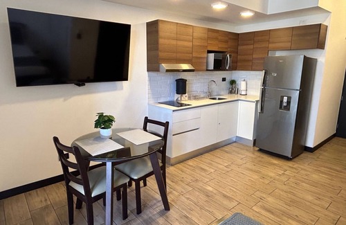 Zona 10 Apartment | EÓN 9 - Estudio Moderno, Vista Volcán, Aire Acondicionado