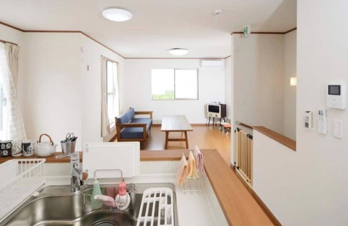 Agarie House | EAST building A house with a garden Children /Nago Okinawa