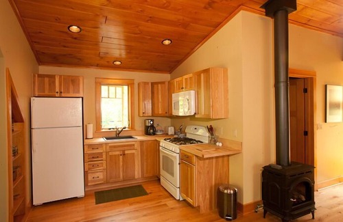 Pilot Knob House | East side Lake George carriage house for rent. Adirondack detailing.