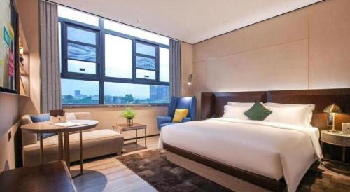Jiangxia District Hotel | Echarm Plus Hotel Wuhan Wenhua Boulevard Dahualing Subway Statiom
