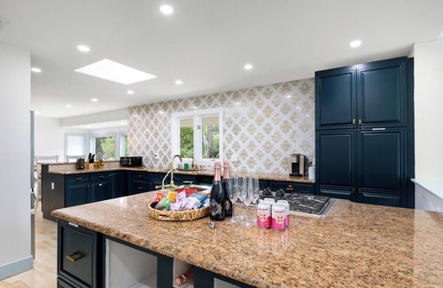 Monroe House | Elegant and spacious home with sauna and heated pool