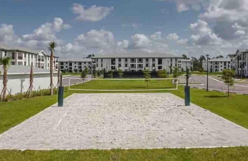 Eastwood Village Apartment | Elegant Pool & Hot Tub with Palm Trees #201