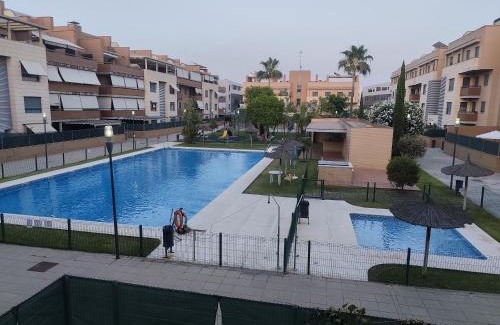 Camas Apartment | Elegante apartamento con piscina A un paso de Sevilla San Miguel