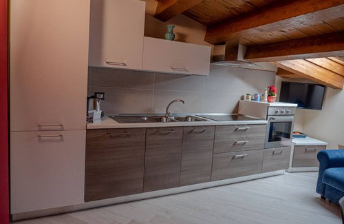 Rotonda Apartment | Elegante e Moderno Bilocale in Mansarda