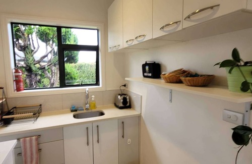 Henderson House | Elevated Family Sized Guest-house with Beautiful Views