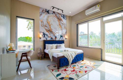 Faridabad Villa | ELIVAAS 3 BHK Amber Villa With Pvt Pool, Game Room & Studio Rooms