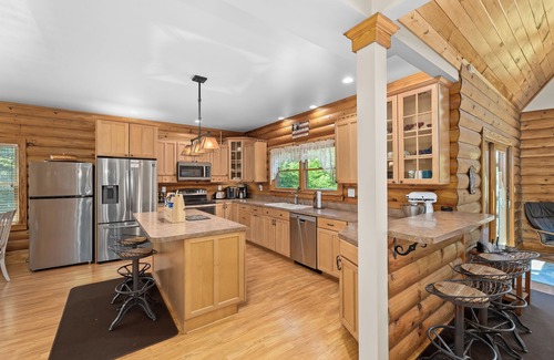 Bumpass Cabin | Enchanting 5-Bed/5-Bath Lakefront Log Cabin with Private Cove and Sandy Beach.