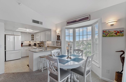 Palm Island Villa | Enjoy a Beautiful Gulf Sunset from the Screened Porch on Resort Villa A3221B