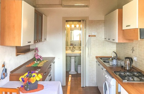 Vallebona House | Enjoy a fantastic view of the countryside and the sea in the horizon.