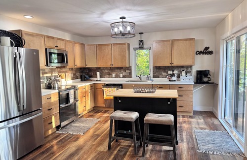 Elk River House | Enjoy beautiful sunsets year round from this cozy 3 bedroom home on Lake Orono.