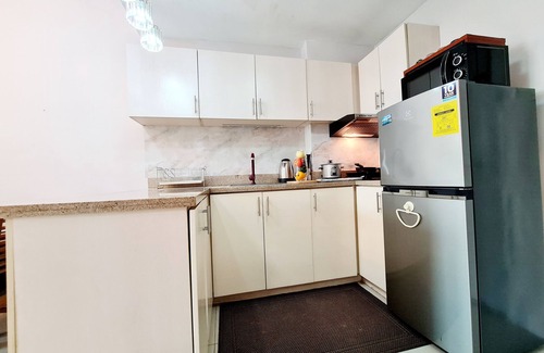 Santo Cristo Condo | Entire 2BR nr SM North Fastnet Netflix Parking