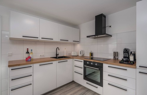 Schwerte Apartment | Entspannung im Boho-flair: Sauna & Whirlpool