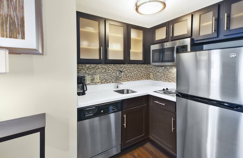 Mayfield Heights Condo | Equipped King Suite | 24-Hour Business Center, Fitness Center + Free Daily Breakfast