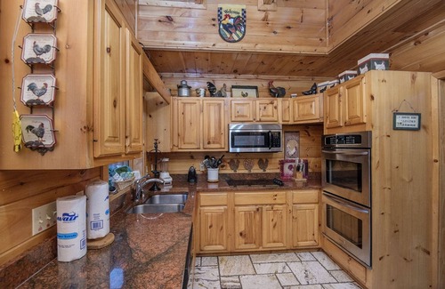 Pigeon Forge Cabin | Ern854 - Wagon Wheel Lodge - Great Location! Close To All The Action! 9 Bedroom Cabin by RedAwning