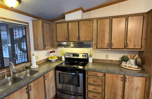 Munds Park Cabin | Escape to Pinewood Canyon Cabin — a cozy 2BR/2BA retreat nestled in the pines of Munds Park. With Inviting interiors, a relaxing deck, and direct forest access, it’s the perfect basecamp for year-round adventure and mountain serenity.