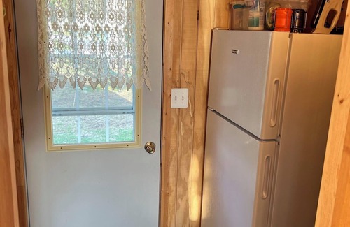 Lewiston Cabin | Escape to the Holiday House. Serenity of Sunsets, Lakeside boat dock included.