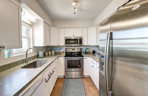 City-by-the Sea House | Estes Oasis 4 Bedroom Home by RedAwning