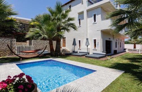 Roumeli Villa | Eva & Dimitrios Villas, Captivating Oasis with Pools & BBQ, By ThinkVilla
