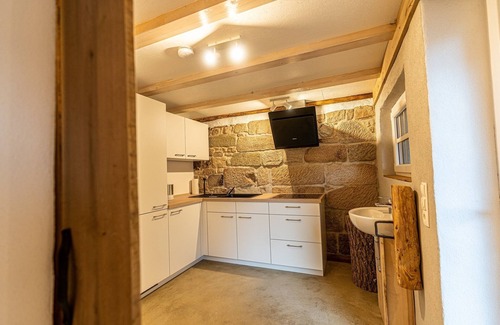 Rauhenebrach House | Exceptional barn loft with open roof truss