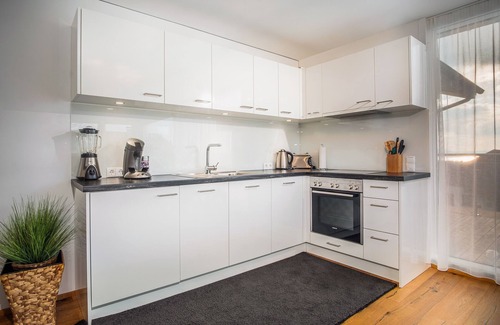 Hoerbranz Condo | Exclusive 2-room apartment with balcony and lake view, 55m², near the lake