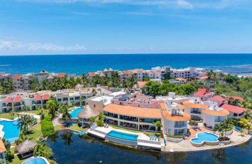 Puerto Aventuras Apartment | Exclusive, Lagoon Front, 2 min beach, Groundfloor, Grill & Paddleboard