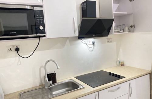North Legon Apartment | Executive suite with a pool