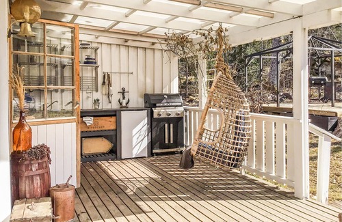 Grisslehamn House | Experience pure relaxation in this beautiful wooden house.