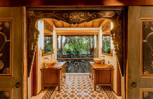 Jasri Villa | Exquisite beachfront joglo in lush coconut grove