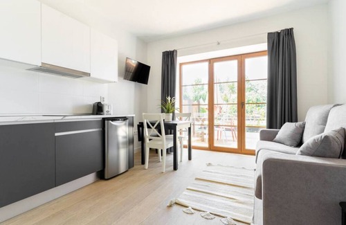 Villaverde de Pontones Apartment | Family apartment with private garden and views of the main garden.