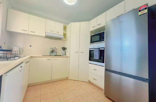 Sandstone Point House | Family friendly 3 bedroom house with garden, full amenities, and use of pool.