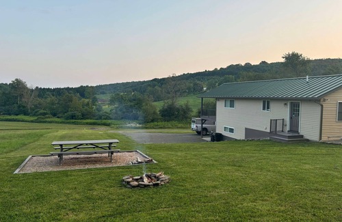 Whitney Point Cottage | Family friendly cottage, covered deck, close to lake to fish, swim, and boat