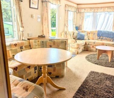 Bryn-crug Ski Chalet | Family-Friendly Woodland Caravan Pool & Bar