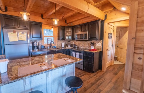 Hendersonville Cabin | Family-Friendly Log Cabin with Hot Tub, Fire Pit & Game Room – Pet Welcome!