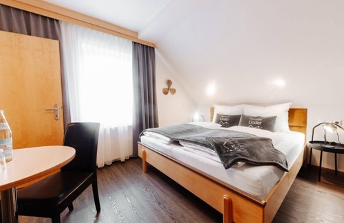 Seeboden Bed & Breakfast | Family room Eco garden view - Pension Linder