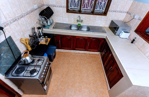 Kireka House | Family-sized, 6-bedroom town house: King bed, Free Wi-Fi & Parking