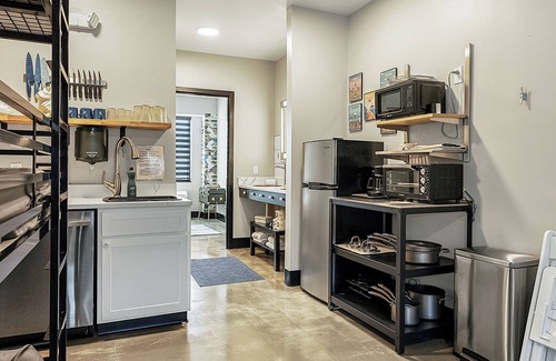 Pacific Hotel | Family suite with private kitchenette in boutique hotel with onsite activities