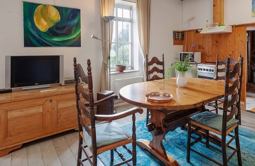 Burum Apartment | Farmhouse by Lauwers River with Rowing Boat