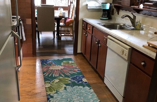 Howell House | Fenced in yard! Lovely Mid Century Feel with all Bedrooms facing the Water!