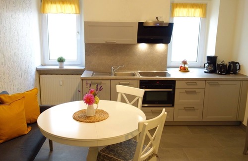 Meissen Apartment | Ferienhof Gräfe - Apartment "Kräuterstübchen" with fireplace, pool & sauna