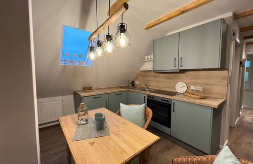 Pilsum Apartment | Ferienwohnung Amelie im Herzen Pilsums