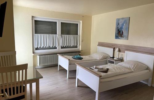 Fuldabruck Apartment | Ferienwohnung mit 4 Betten - Balkon - Küche