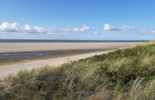 Roggenstede Apartment | Ferienwohnung Nordsee Gulfhof Dornum - mit großem Garten
