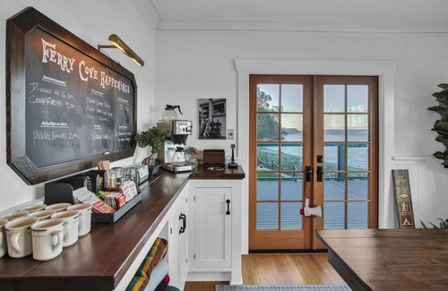 Clinton House | Ferry Cove - Private low bank beachfront property.