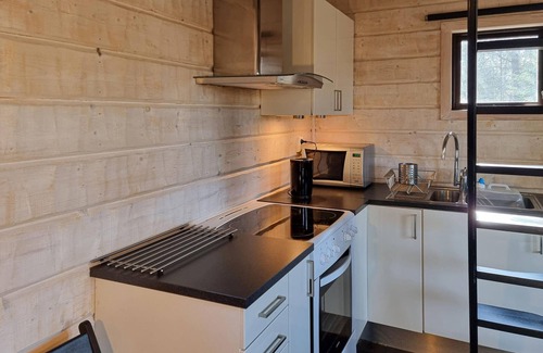 Billdal House | Find rest in this cozy wooden cabin in the forest!