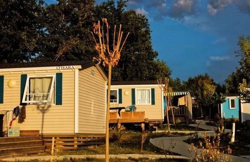 Martiel House | Flower Camping Le Lac aux Birds * - Mobile home Comfort 30 m2 (3 bedrooms) + Clim + semi-covered terrace 10m2 6 people