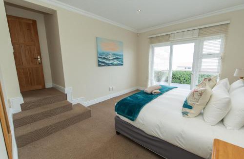 Kini Bay House | Footprints In The Sand - Kini Bay