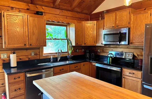 Merrimac Cabin | Four bedroom log cabin, less than 5 miles to Lane Stadium!
