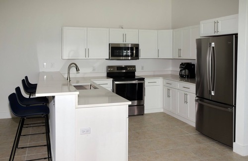 Treasure Cay Resort | FRONTLINE Condo with SENSATIONAL bidirectional views of Treasure Cay Beach!