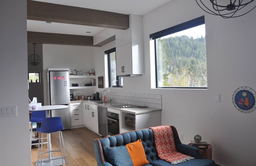 Rossland Apartment | Full apartment with private entry and garage parking in the heart of Rossland.