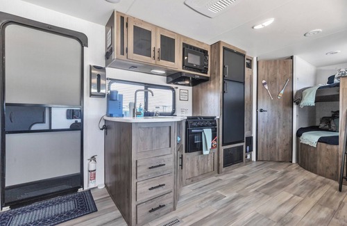 Comfort House | Fully furnished cozy RV in Comfort TX, Sleeps 6, lower weekly and monthly rates.